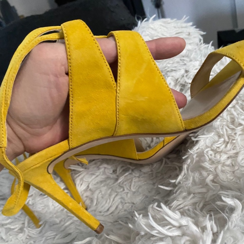 Yellow stiletto 4 inch suede heels. Great condition.